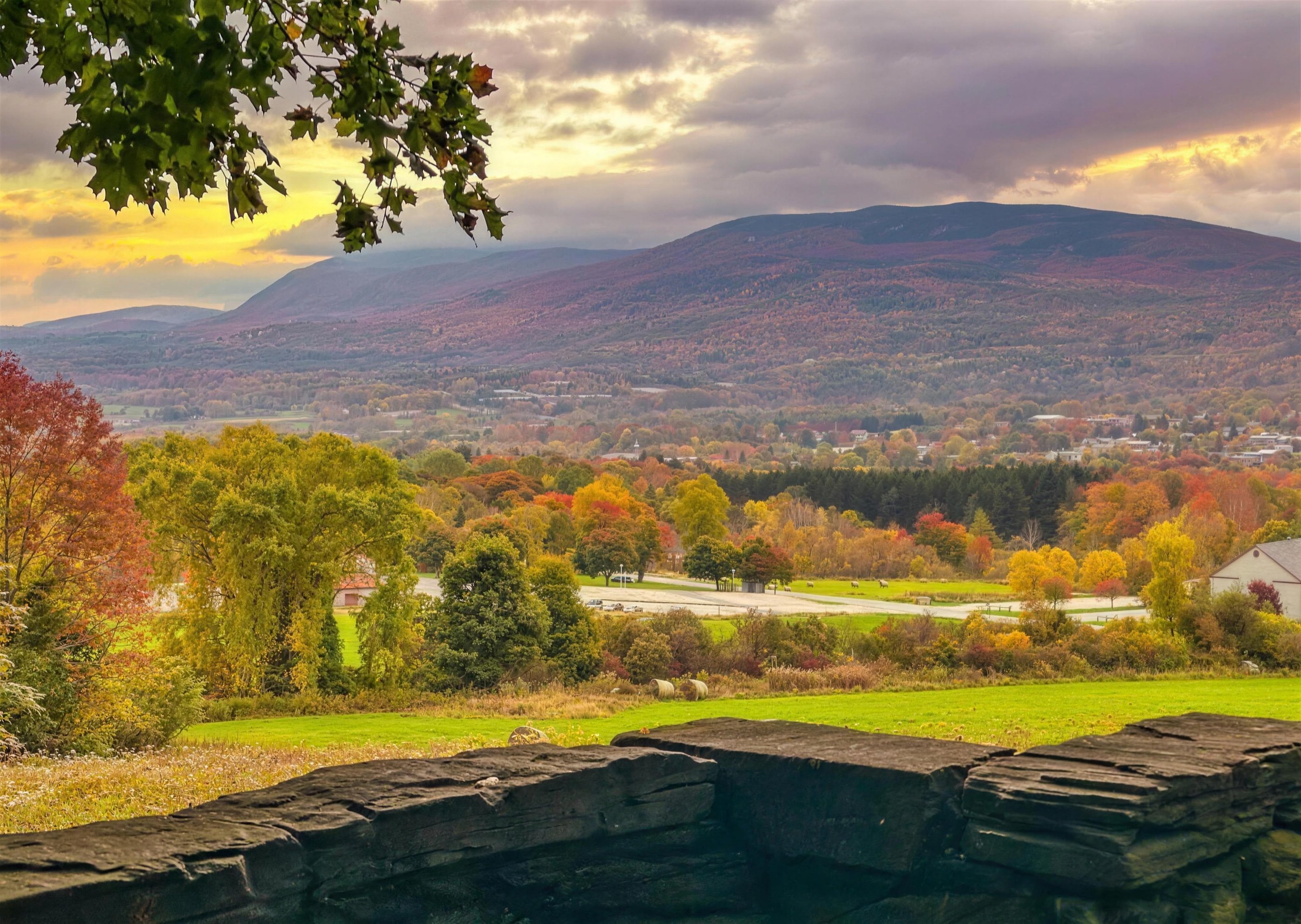Autumn view across the Bennington valley in Vermont, wooded hills rolling toward the horizon