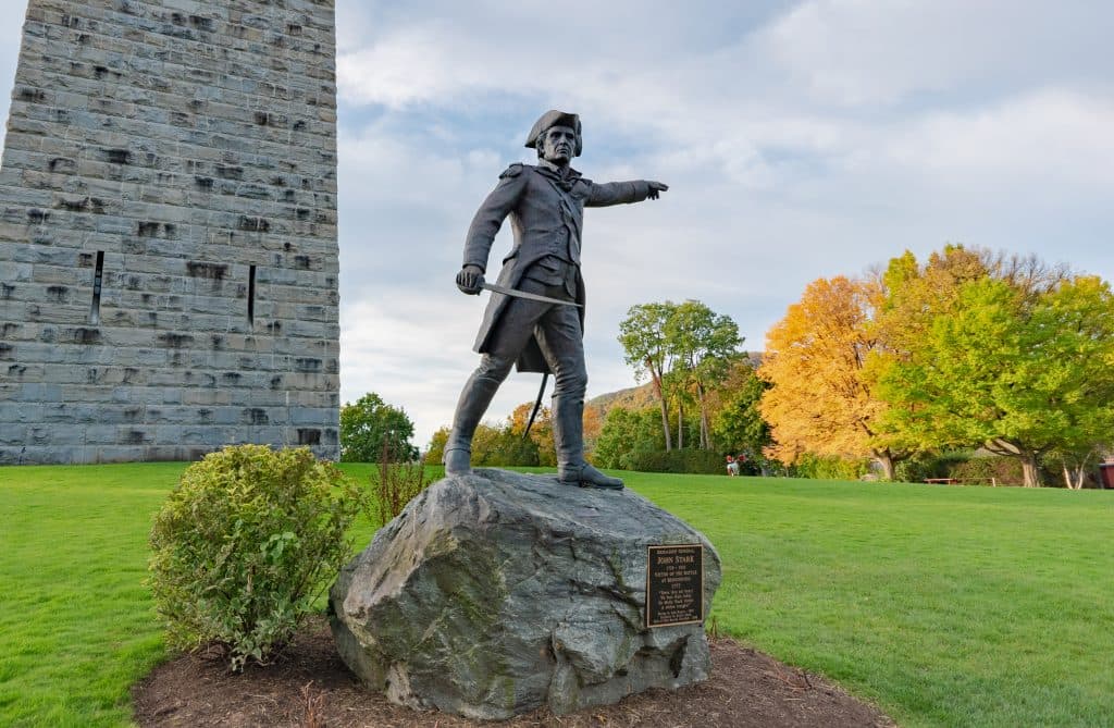 General John Stark statue at the Bennington Battle Monument, framed by autumn color